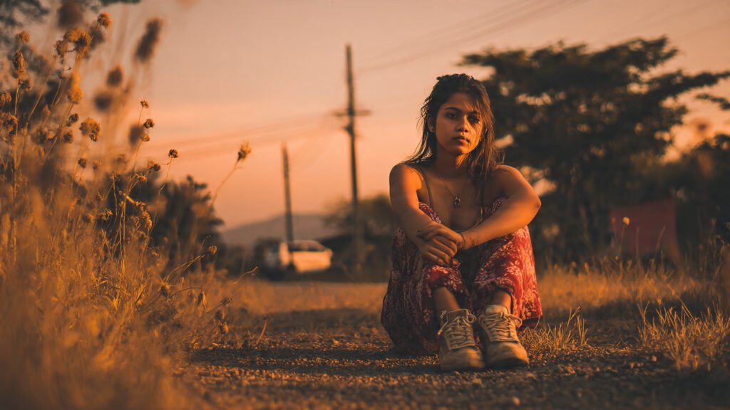 Lonely girl embracing her sadness